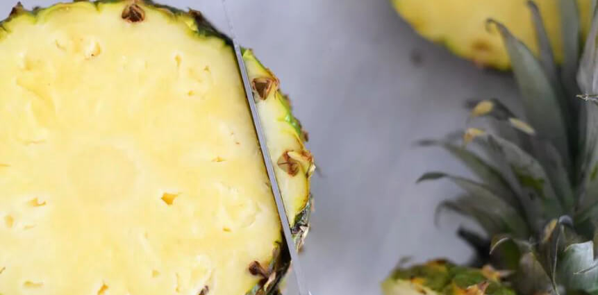The first pineapple cut — Peeling